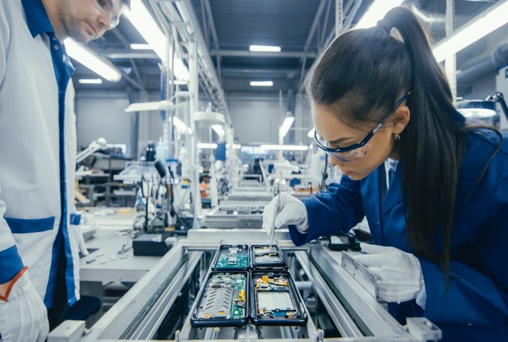 A Worker Showing How Do Printed Circuit Boards Work